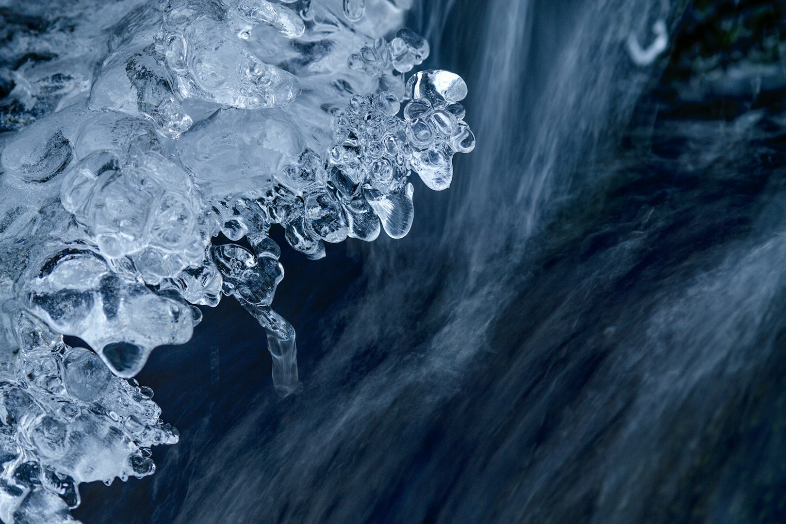 ice and running water in a stream